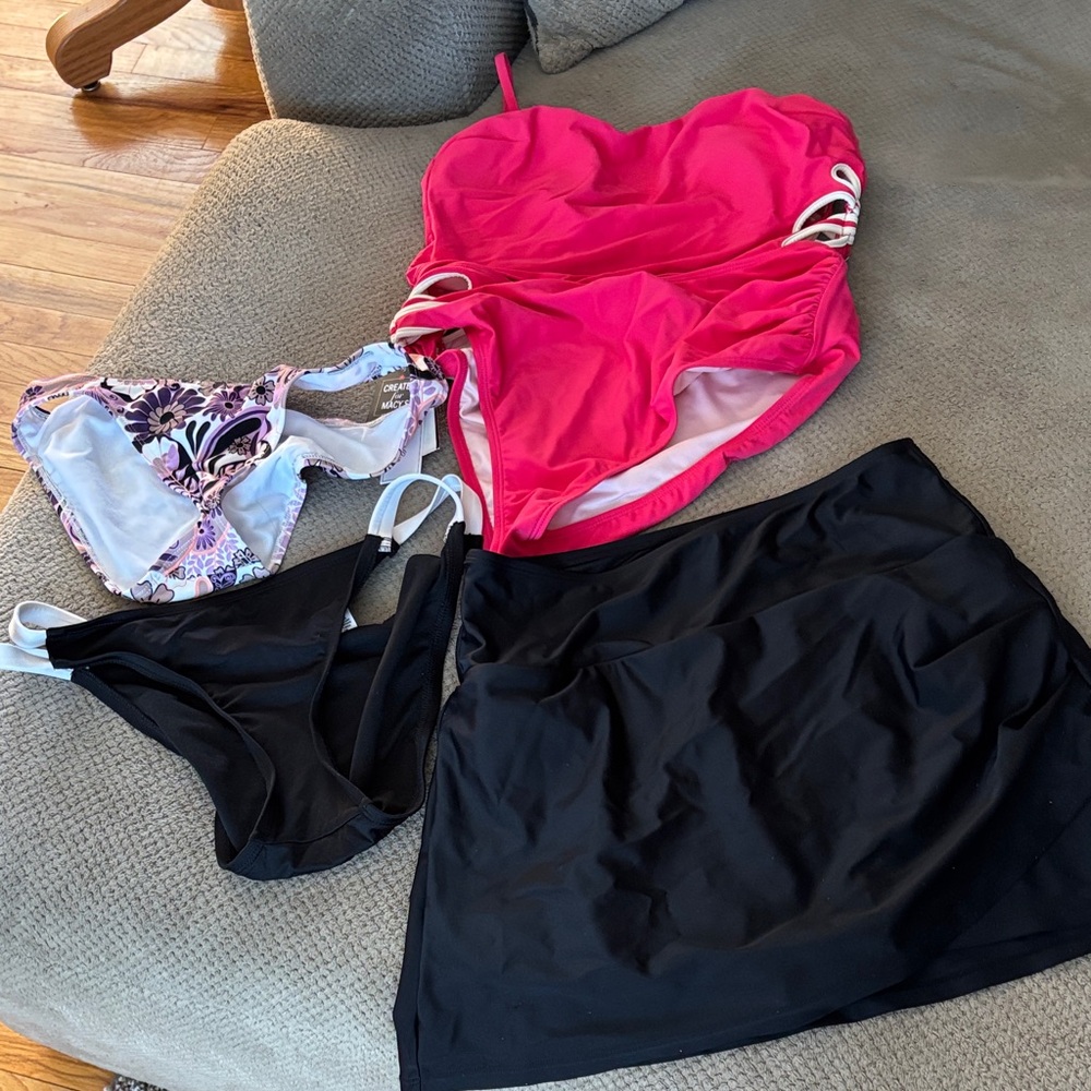 Two piece bathing suit, and three bottoms